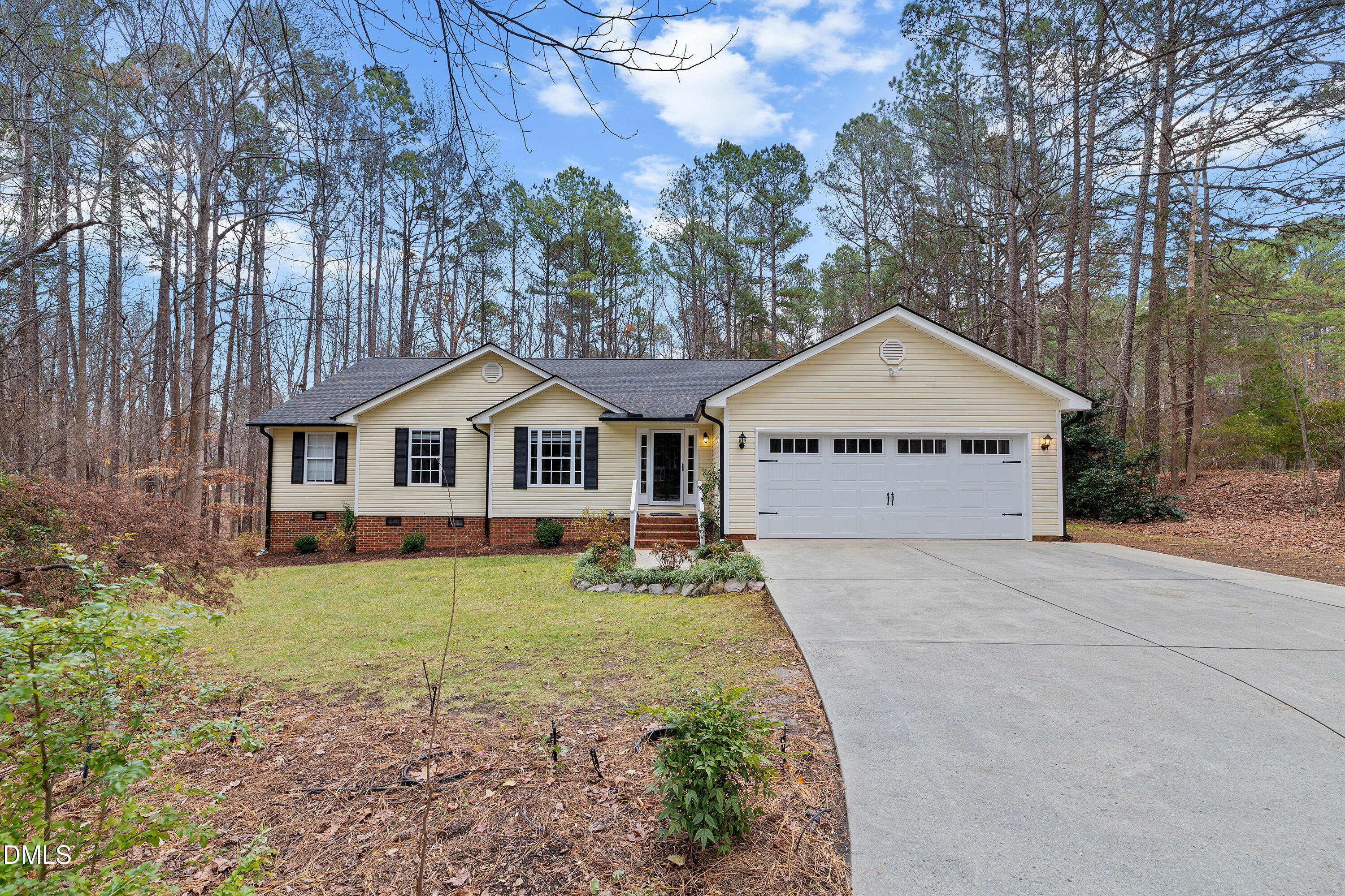 7119 Wexford Woods Trail Raleigh, NC 27613 - Photo 1 of 41 a house with yard in front of it