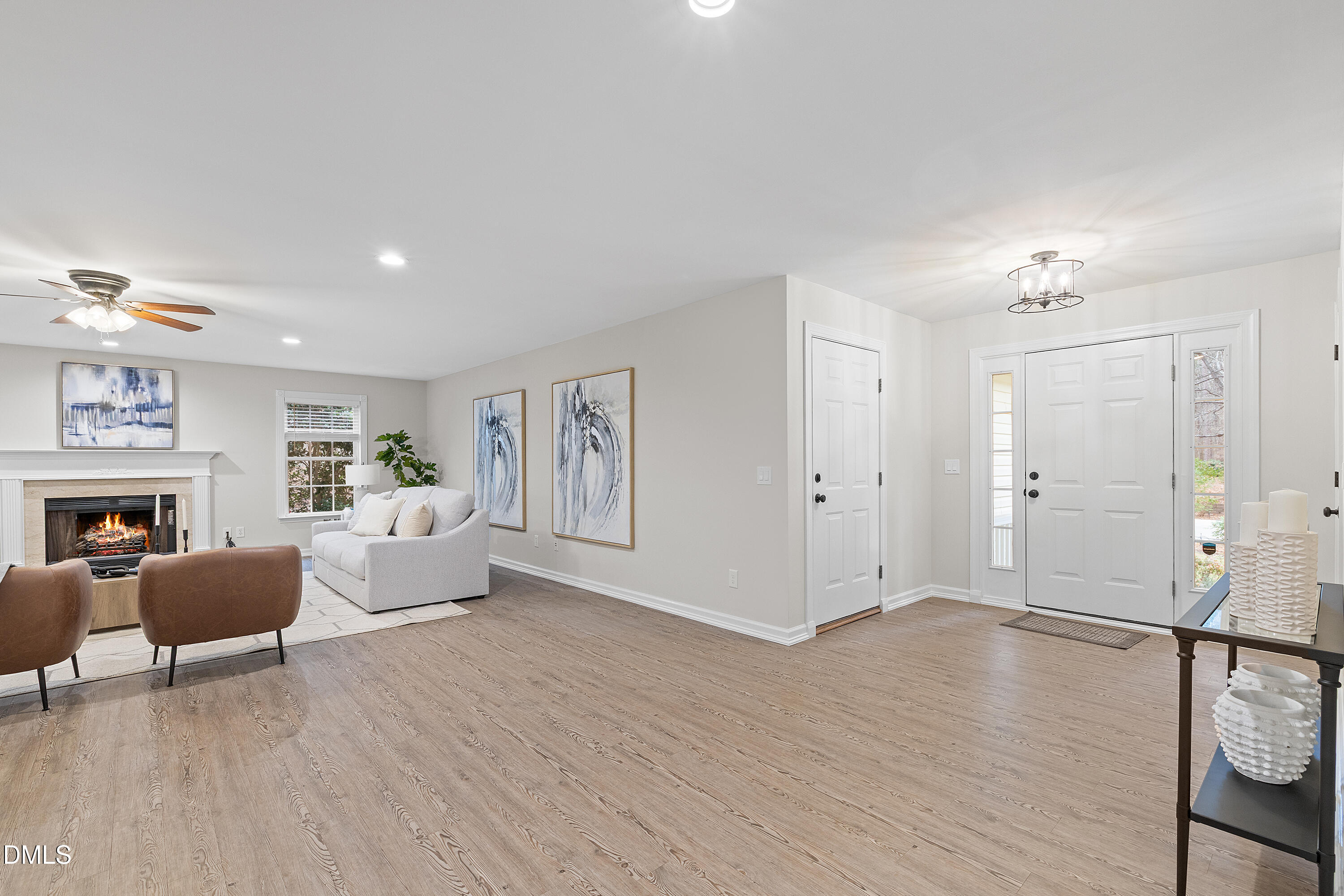 7119 Wexford Woods Trail Raleigh, NC 27613 - Photo 10 of 41 a view of a livingroom with furniture wooden floor and a window