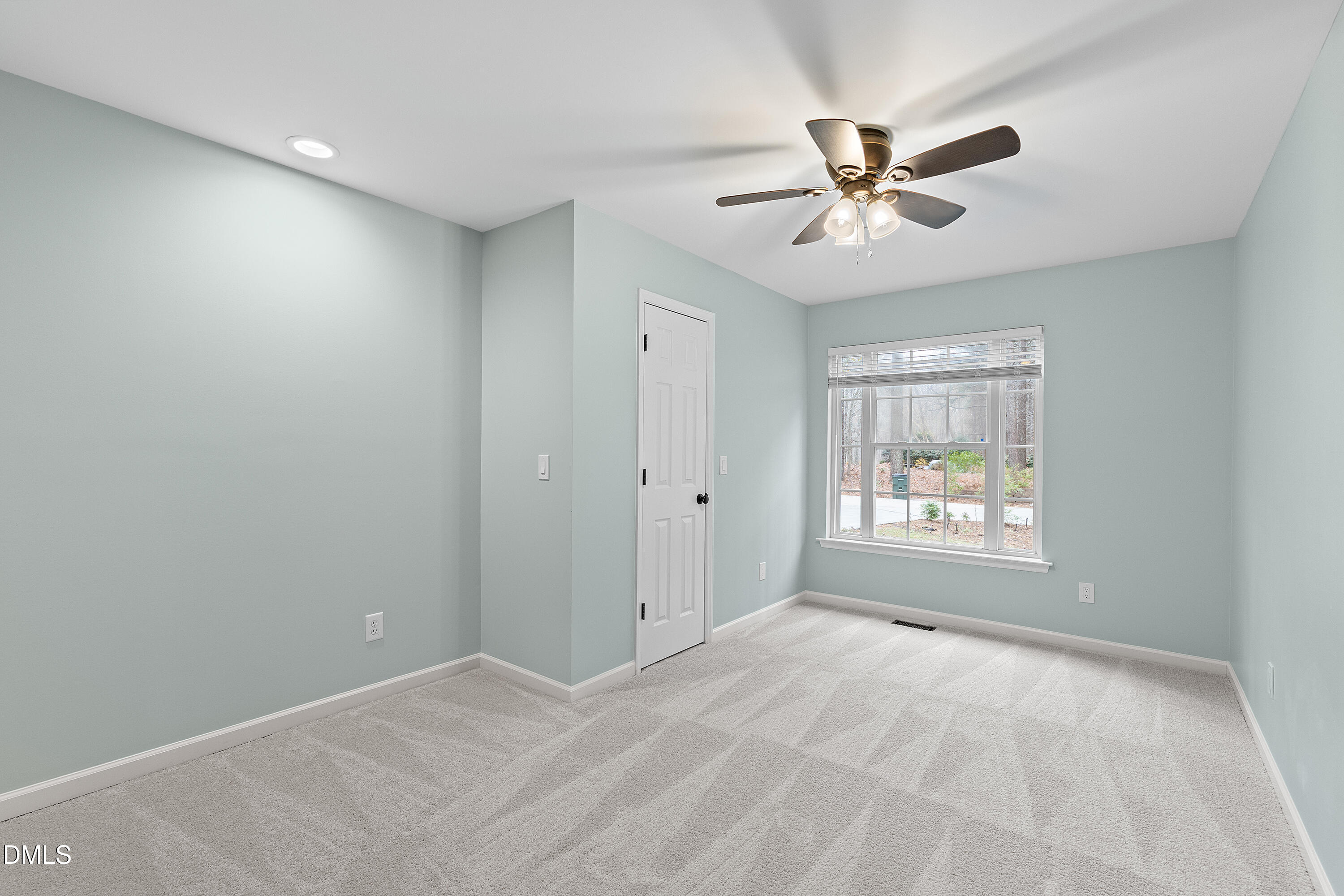 7119 Wexford Woods Trail Raleigh, NC 27613 - Photo 24 of 41 a view of an empty room with a window