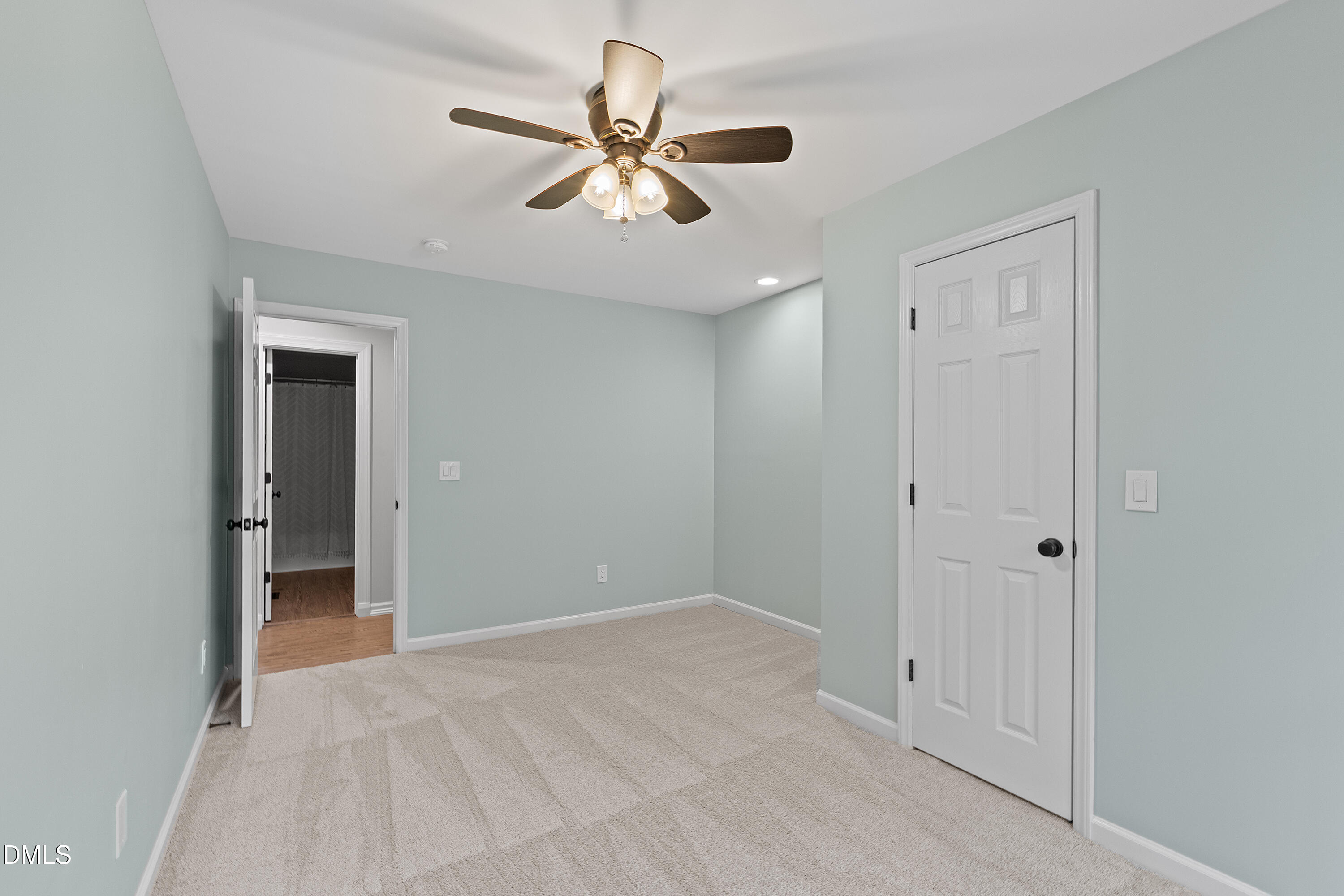 7119 Wexford Woods Trail Raleigh, NC 27613 - Photo 25 of 41 a view of an empty room with a ceiling fan