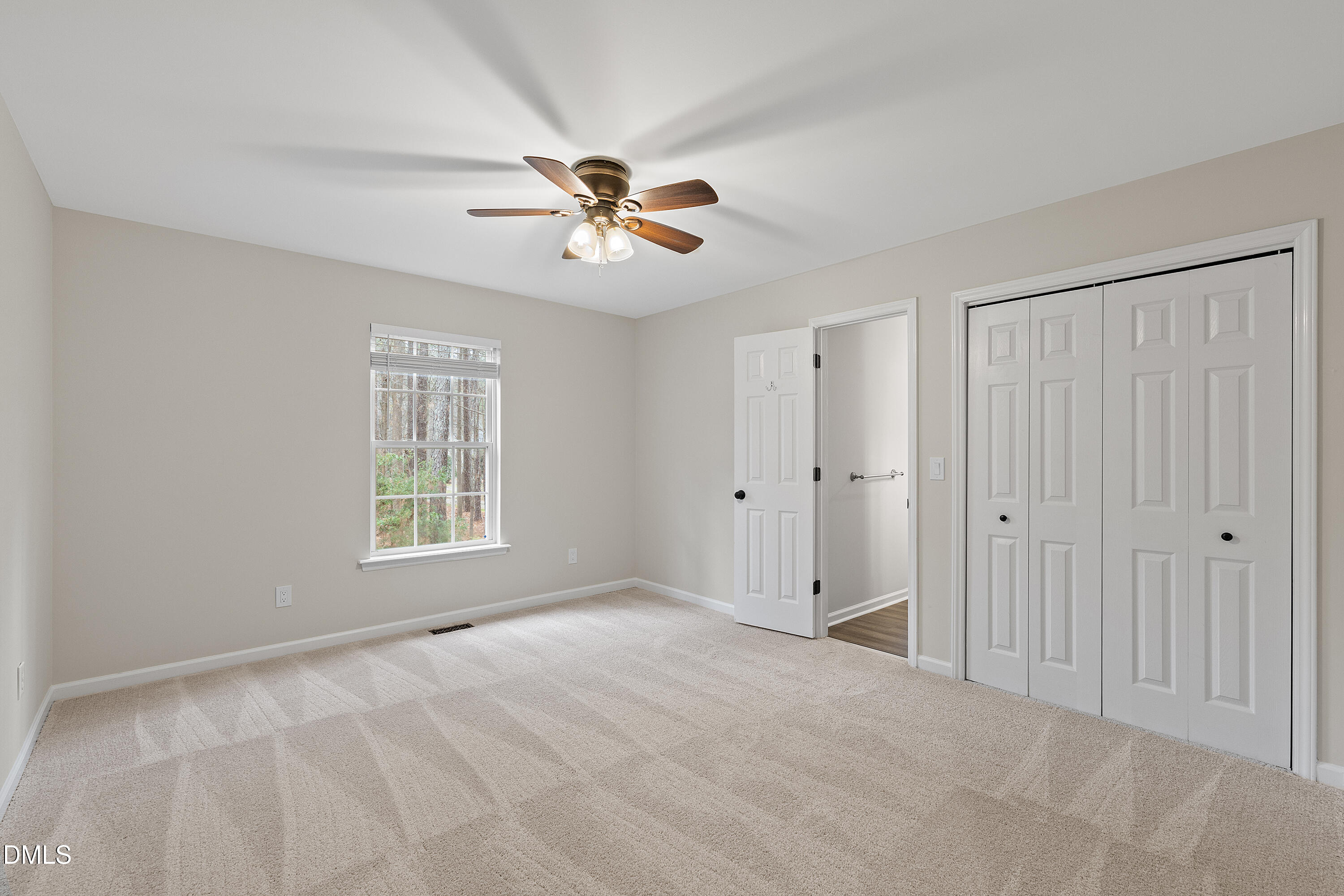 7119 Wexford Woods Trail Raleigh, NC 27613 - Photo 26 of 41 a view of an empty room with a window