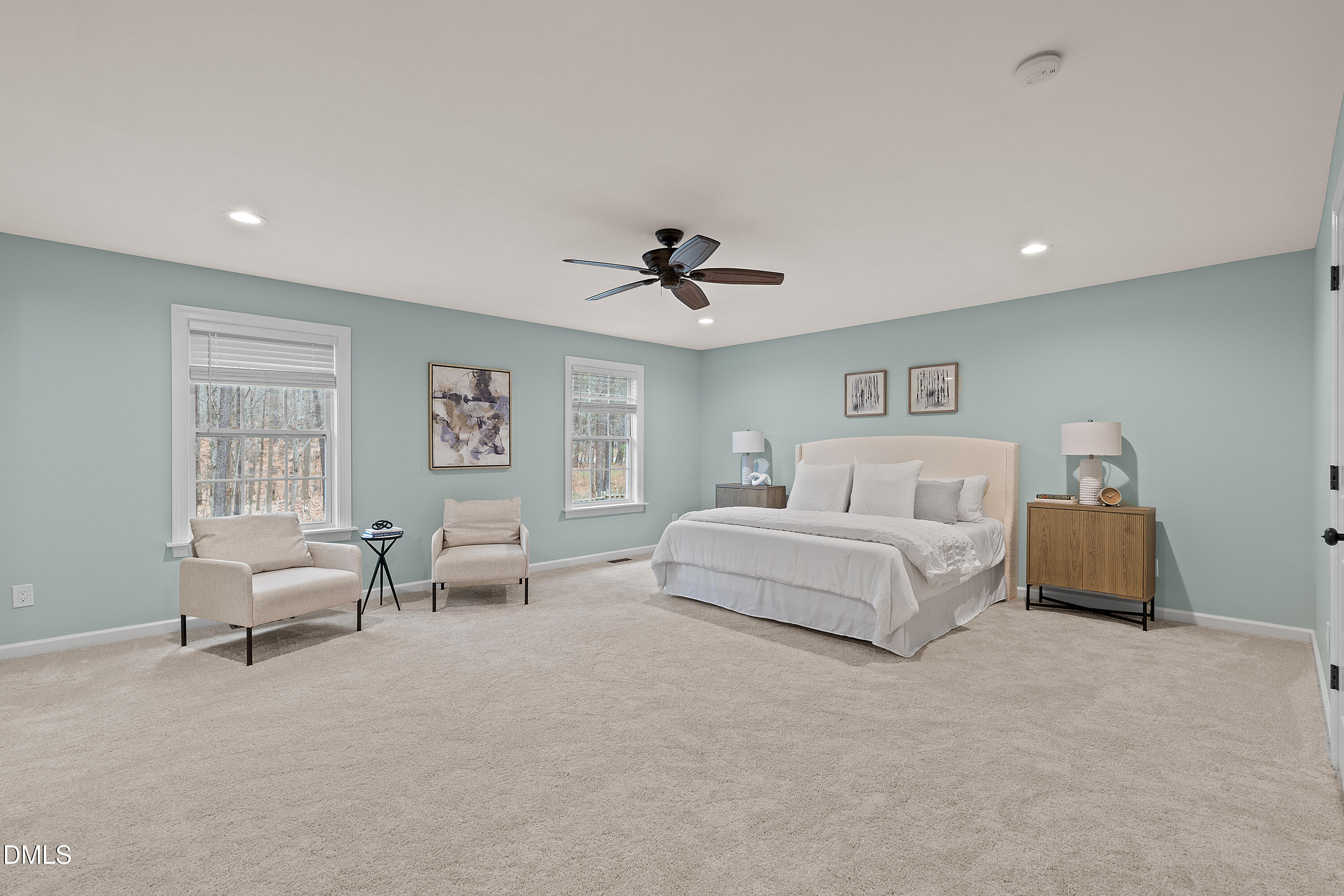 7119 Wexford Woods Trail Raleigh, NC 27613 - Photo 31 of 41 a spacious bedroom with a bed and furniture