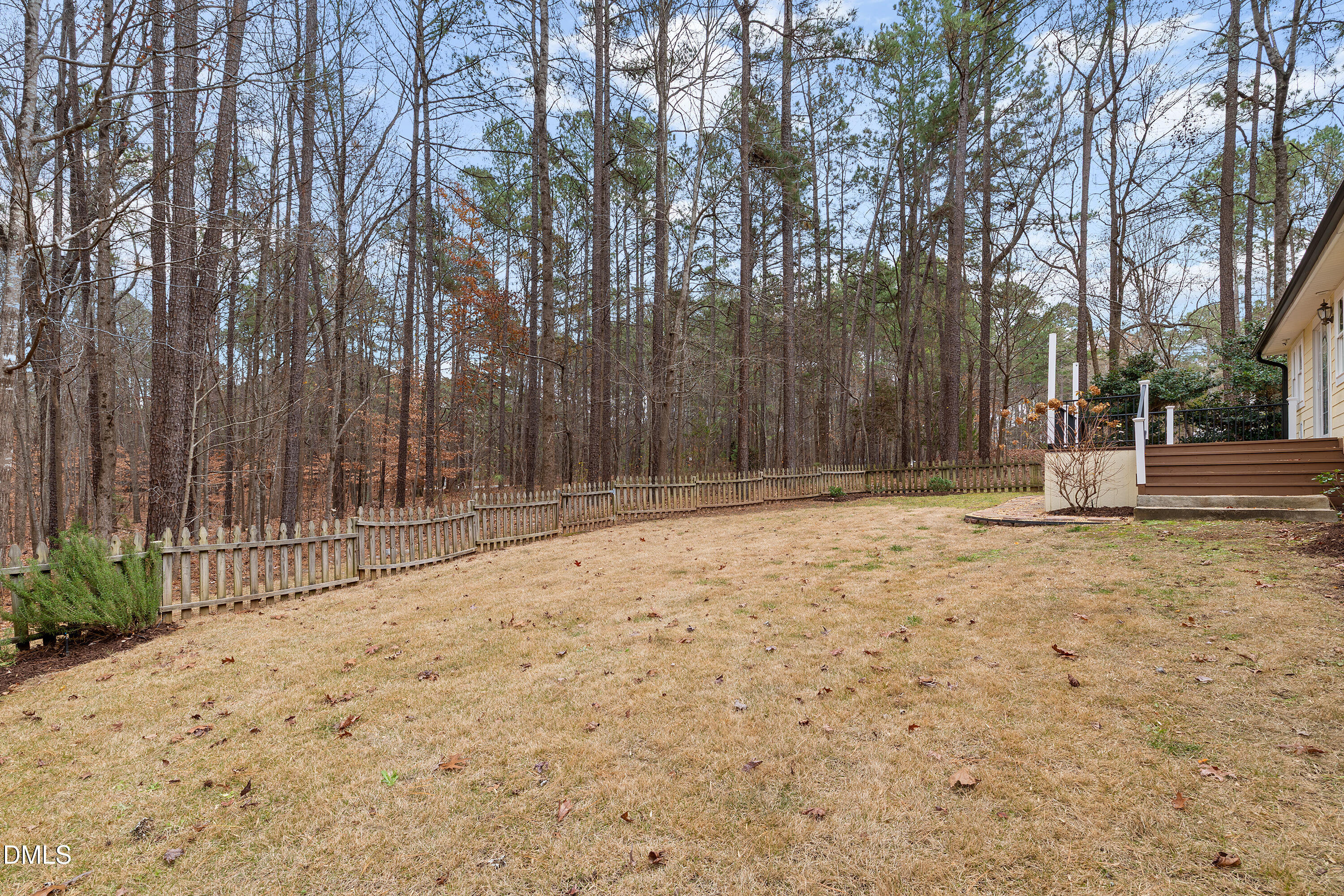 7119 Wexford Woods Trail Raleigh, NC 27613 - Photo 37 of 41 a view of wooden fence and trees