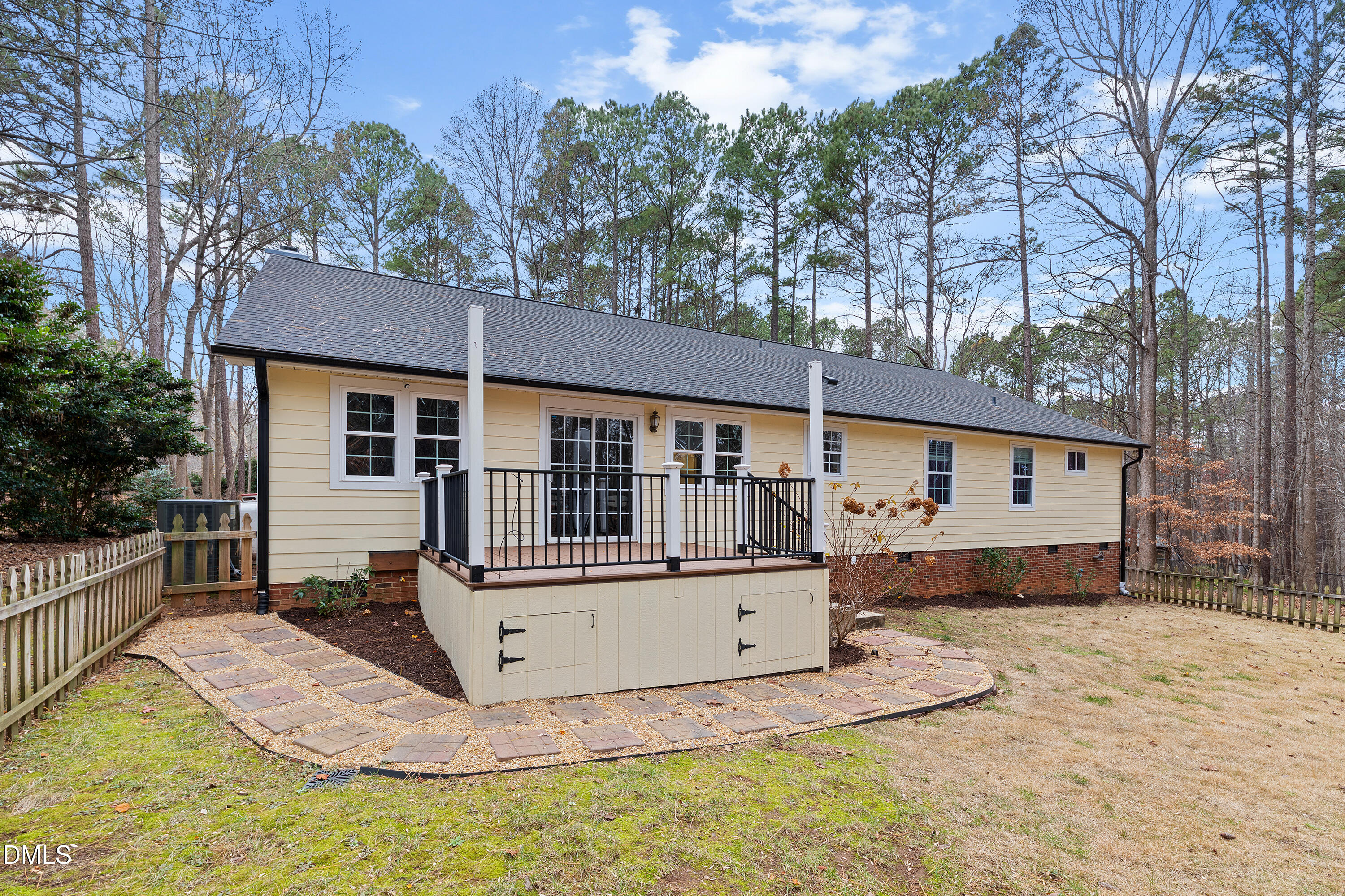 7119 Wexford Woods Trail Raleigh, NC 27613 - Photo 39 of 41 a front view of a house with a yard outdoor seating and garage