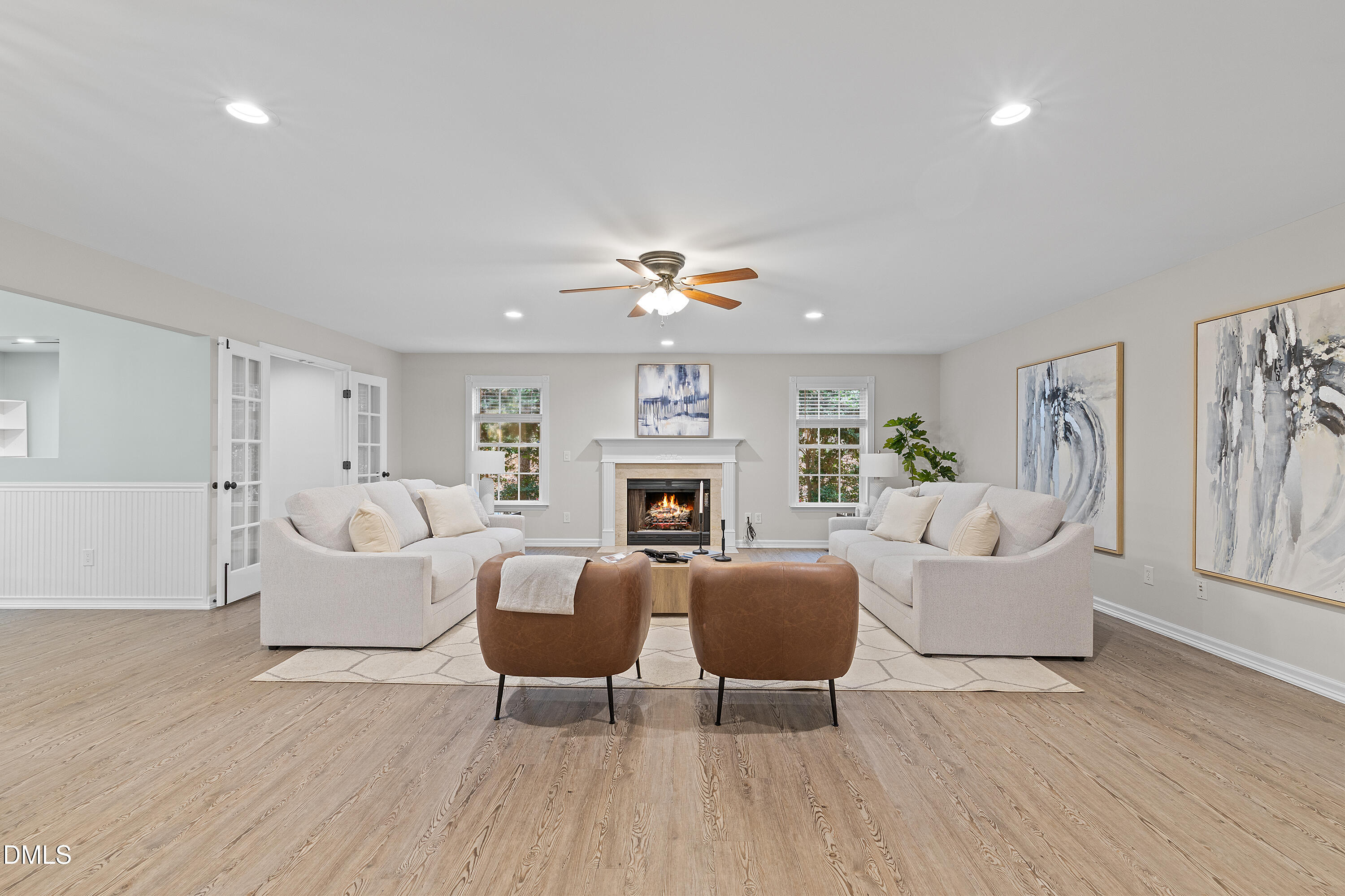 7119 Wexford Woods Trail Raleigh, NC 27613 - Photo 4 of 41 a living room with furniture and a fireplace