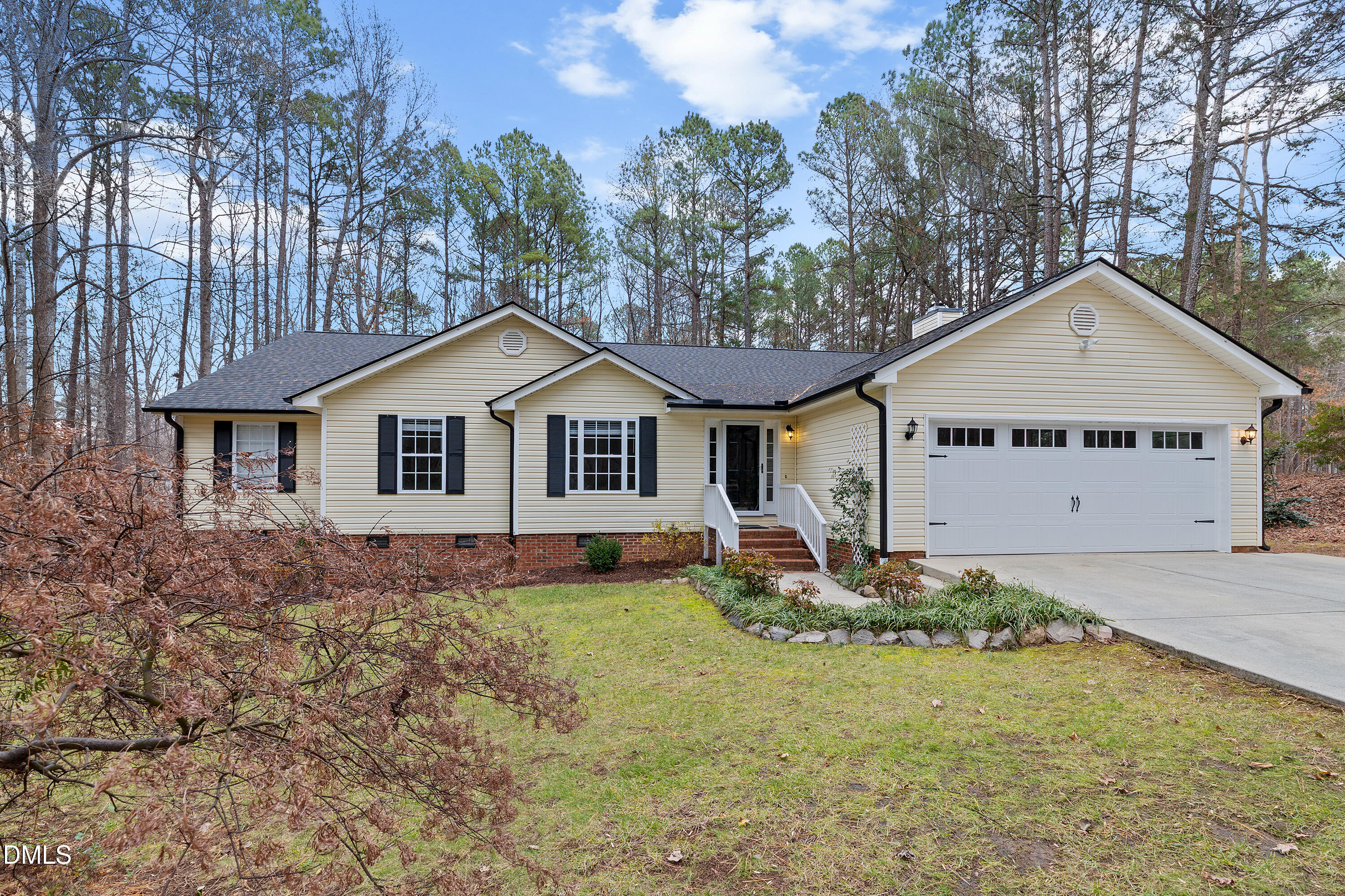 7119 Wexford Woods Trail Raleigh, NC 27613 - Photo 8 of 41 a view of a house with a yard