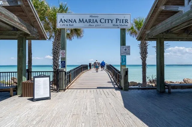 a view of a chairs and table in patio