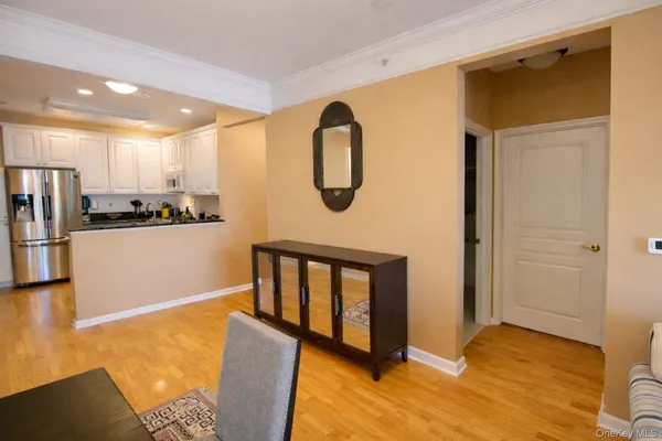 a view of kitchen with furniture and a window