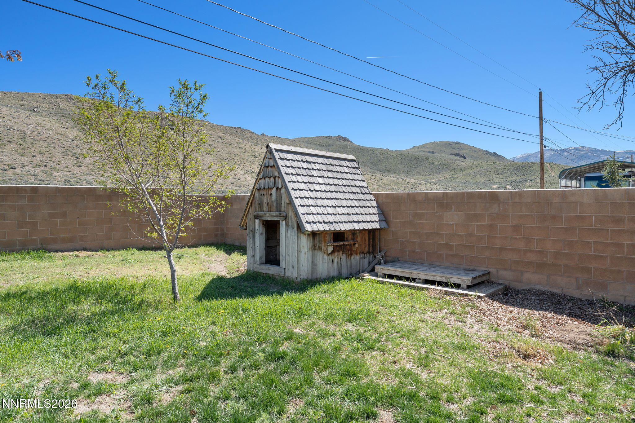 3590 Siskin Lane Reno, NV 89508 - Photo 26 of 31 a front view of a house with a yard