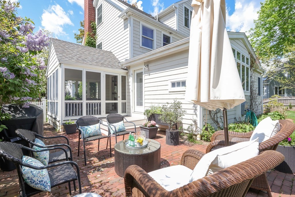 33 Lancaster Road Needham, MA 02492 - Photo 34 of 41 a view of a patio with couches chairs and a potted plants