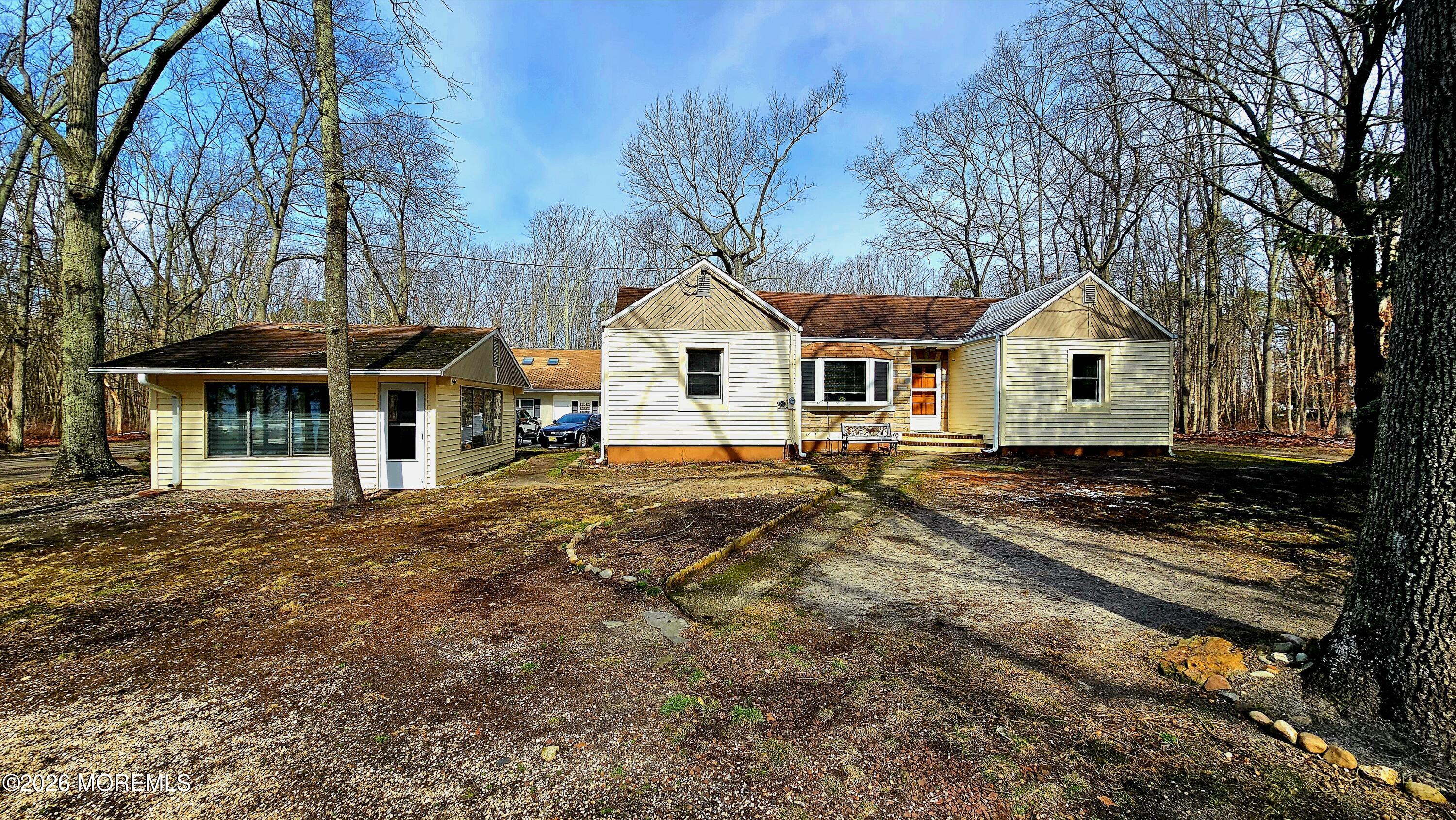 12 Anderson Drive Howell, NJ 07731 - Photo 1 of 26 a front view of a house with a yard