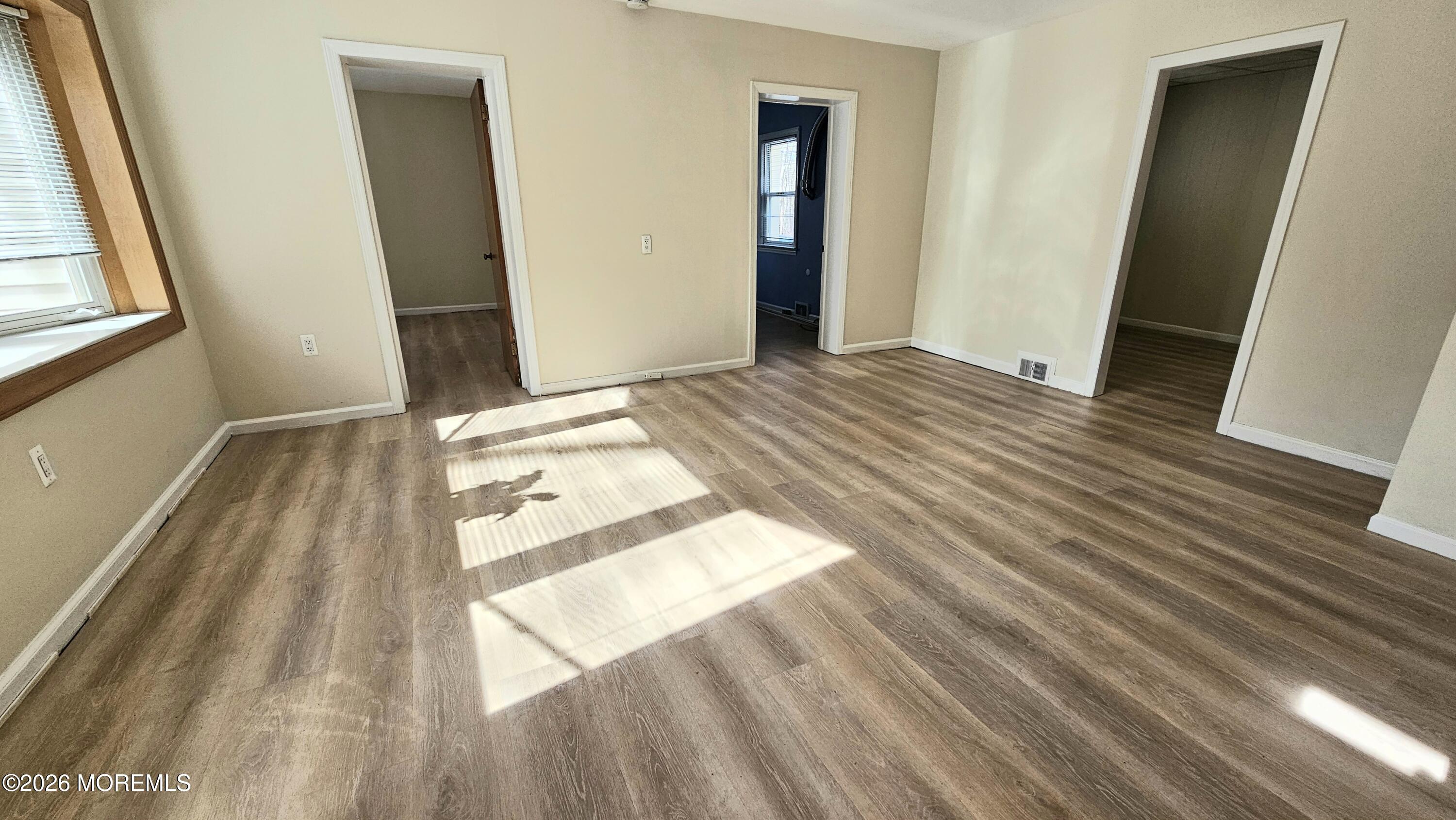 12 Anderson Drive Howell, NJ 07731 - Photo 12 of 26 a bedroom with a bed and wooden floor