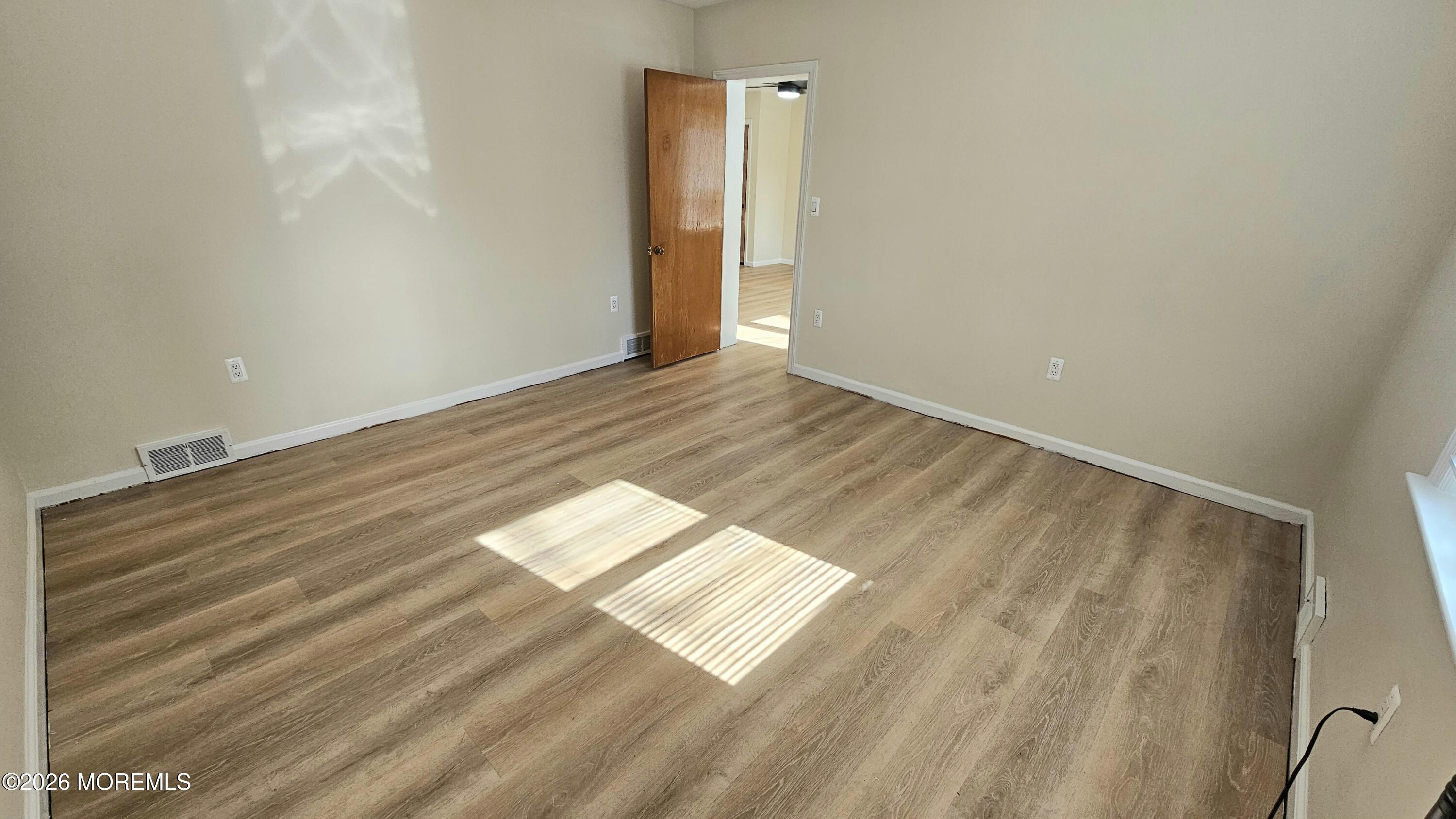 12 Anderson Drive Howell, NJ 07731 - Photo 13 of 26 a view of wooden floor