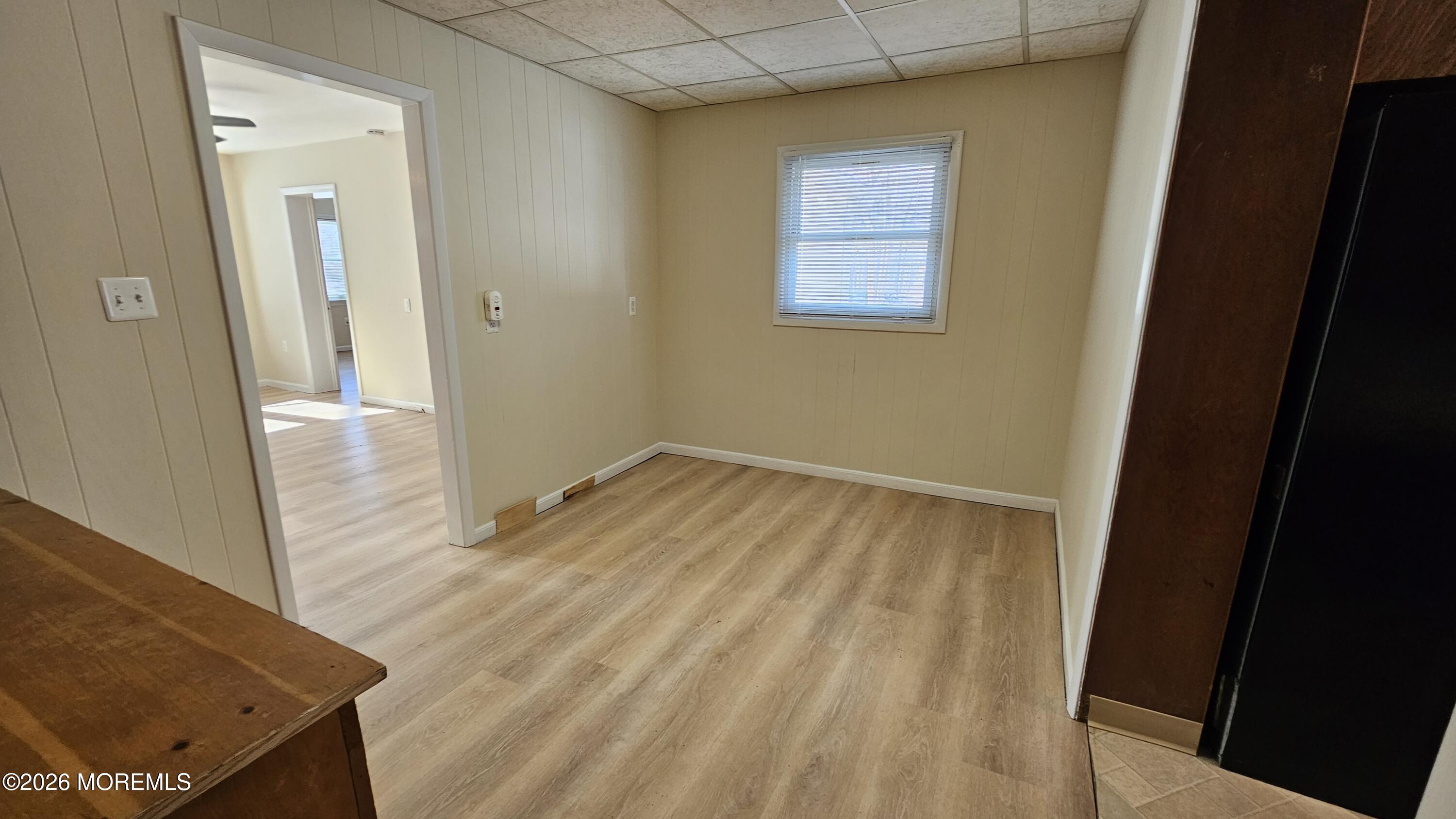12 Anderson Drive Howell, NJ 07731 - Photo 7 of 26 a view of a hallway with wooden floor and closet