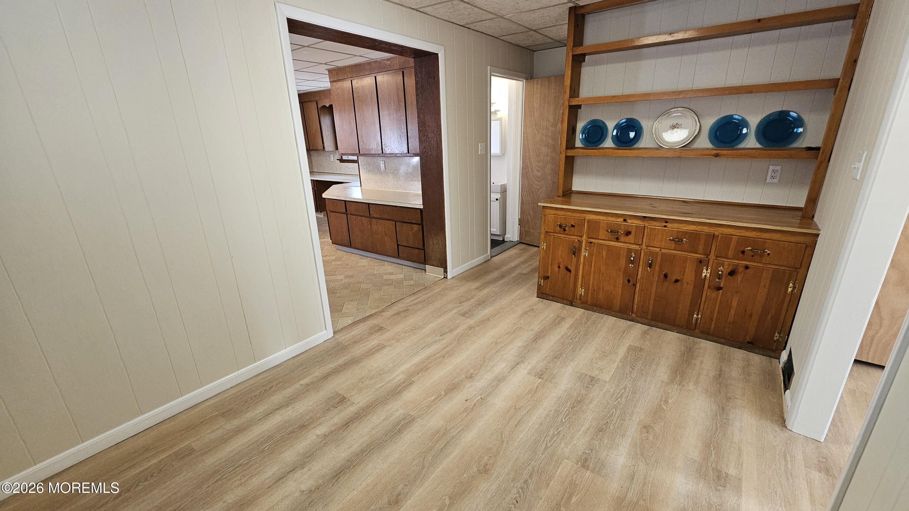 12 Anderson Drive Howell, NJ 07731 - Photo 8 of 26 a view of a hallway to rooms and wooden floor