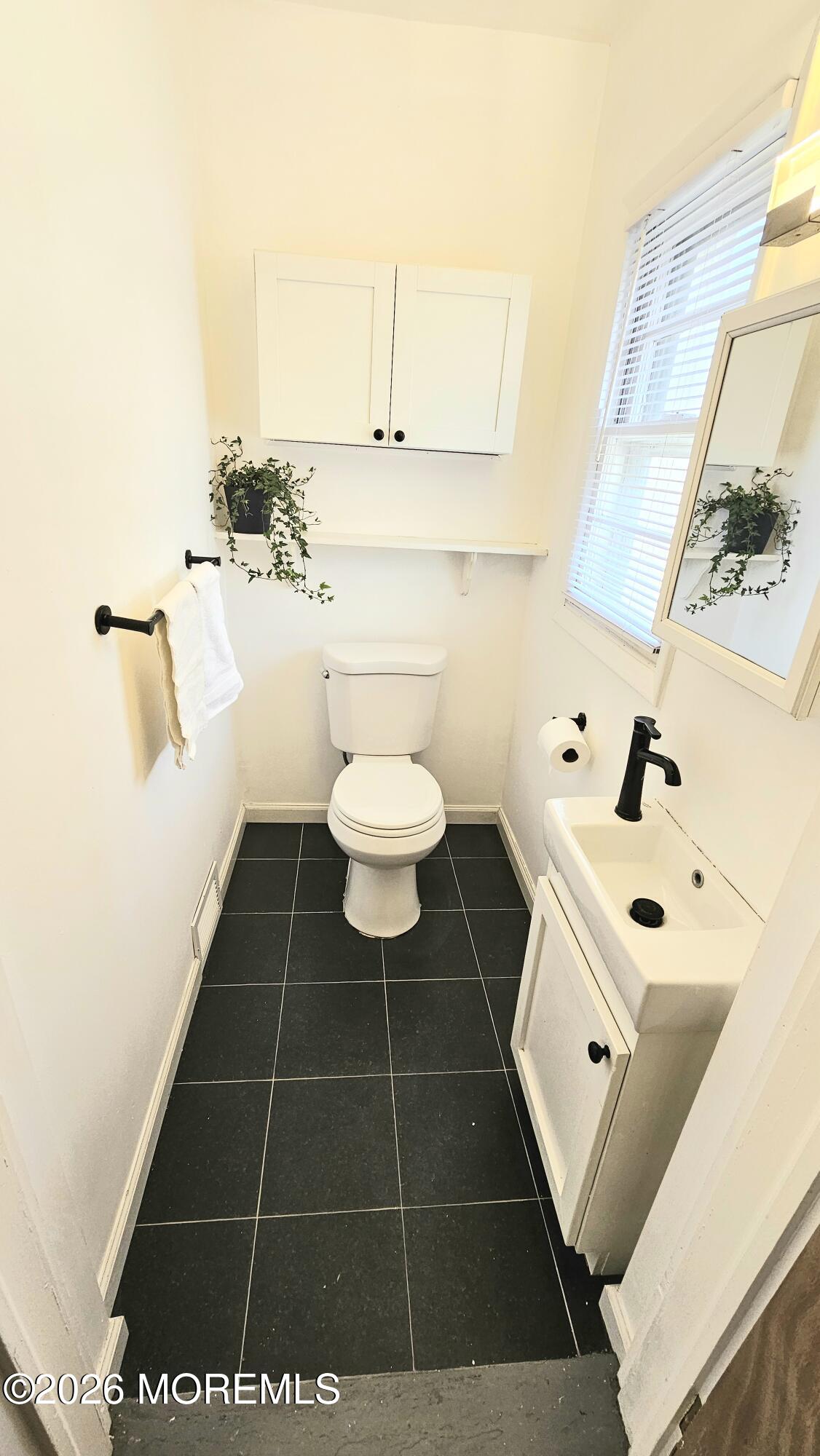 12 Anderson Drive Howell, NJ 07731 - Photo 9 of 26 a bathroom with a toilet and a shower