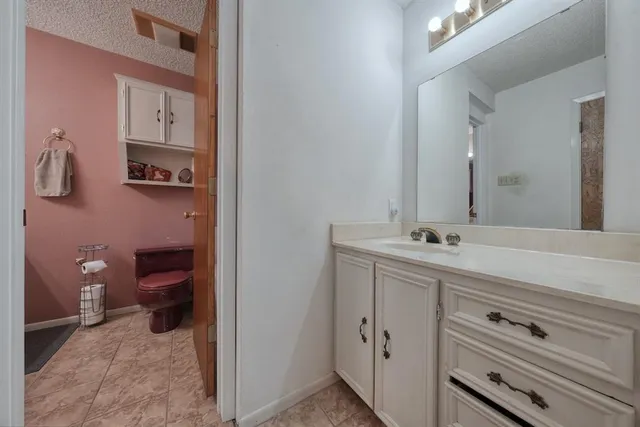 a bathroom with a sink and a toilet