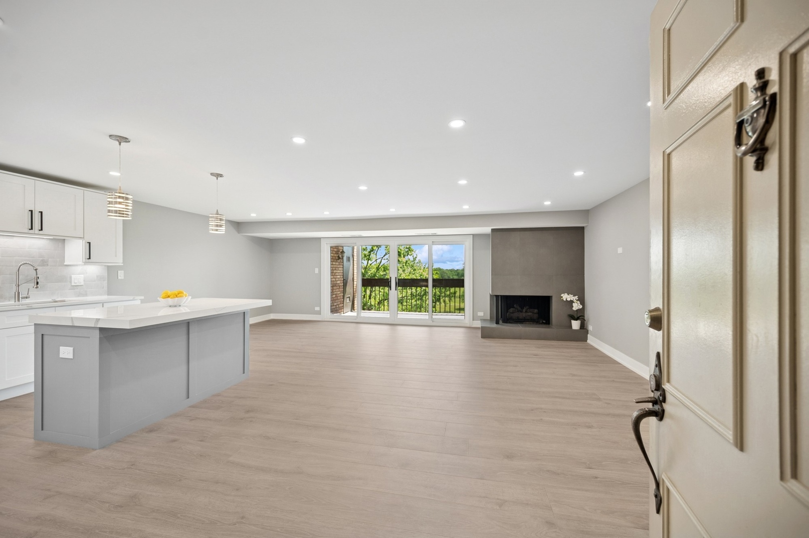 3851 Mission Hills Road, Unit 409 Northbrook, IL 60062 - Photo 2 of 19 a large white kitchen with a window appliances and cabinets