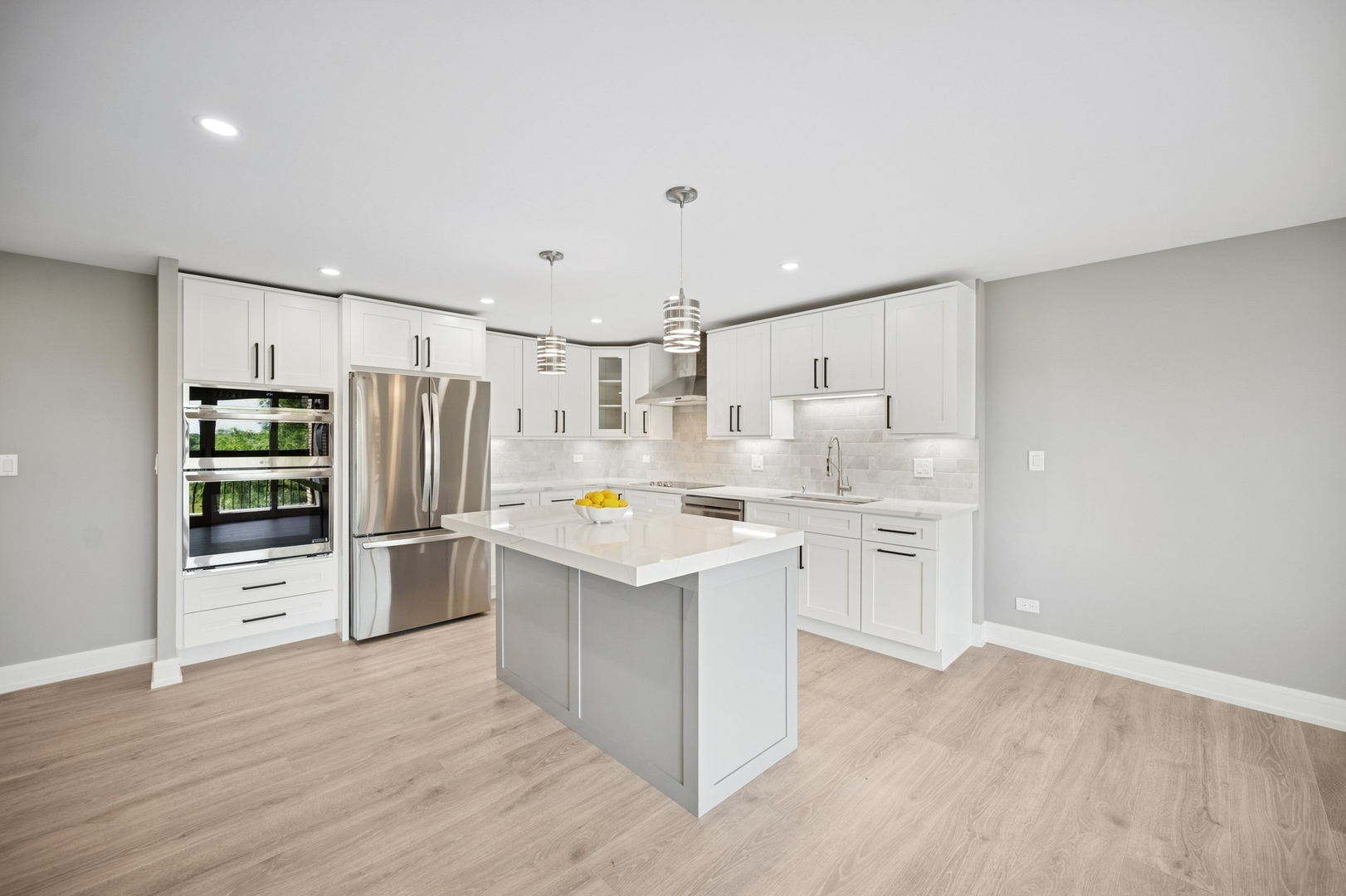 3851 Mission Hills Road, Unit 409 Northbrook, IL 60062 - Photo 4 of 19 a kitchen with refrigerator and cabinets