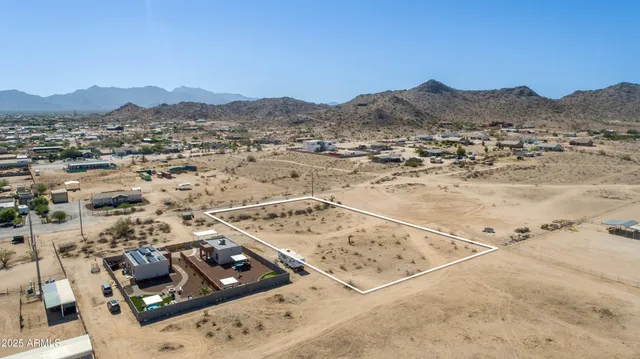 an aerial view of residential house with outdoor space