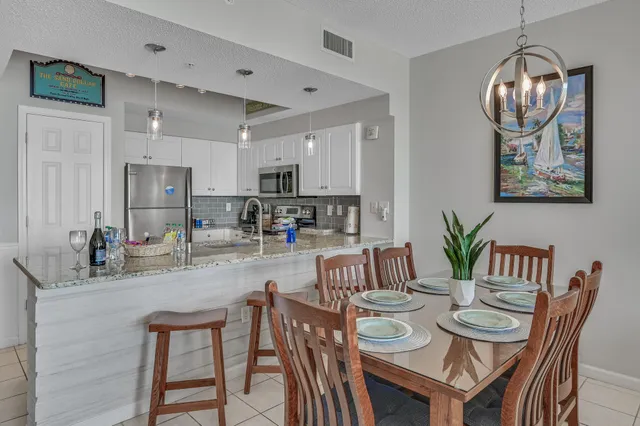 a view of a dining room with furniture
