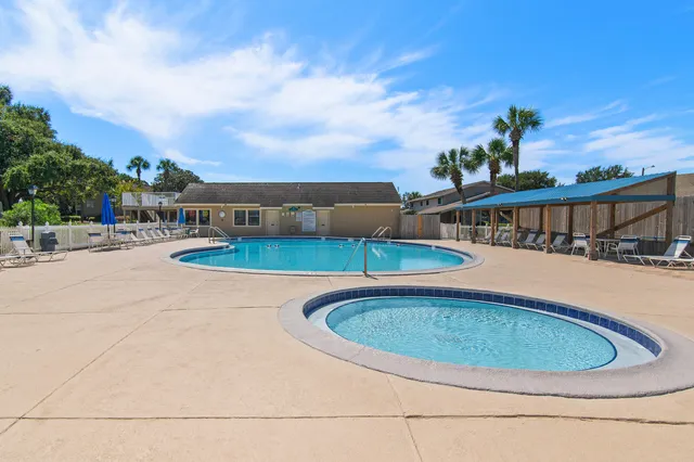 a view of a terrace with chairs