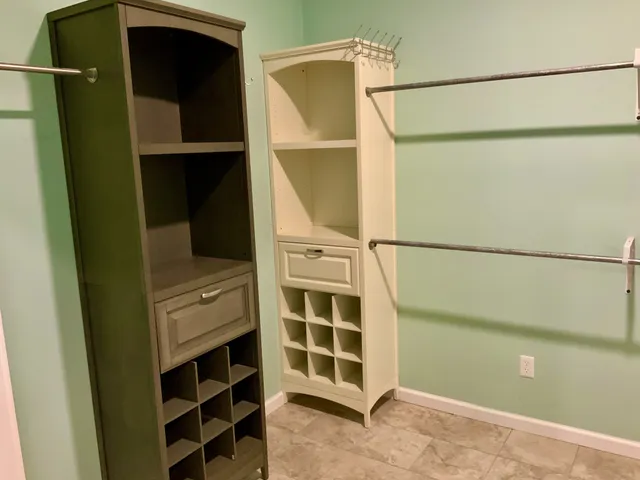 a kitchen with stainless steel appliances granite countertop a stove a refrigerator and a sink