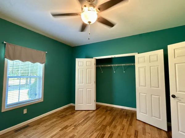 a kitchen with stainless steel appliances a refrigerator sink stove microwave and cabinets