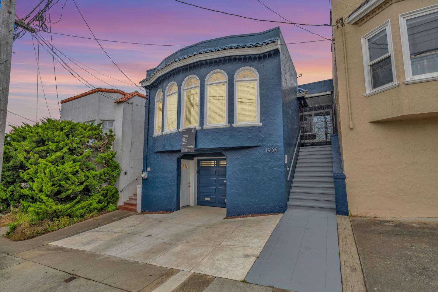 1934 21st Avenue San Francisco, CA 94116 - Photo 1 of 1 a front view of a house with a yard