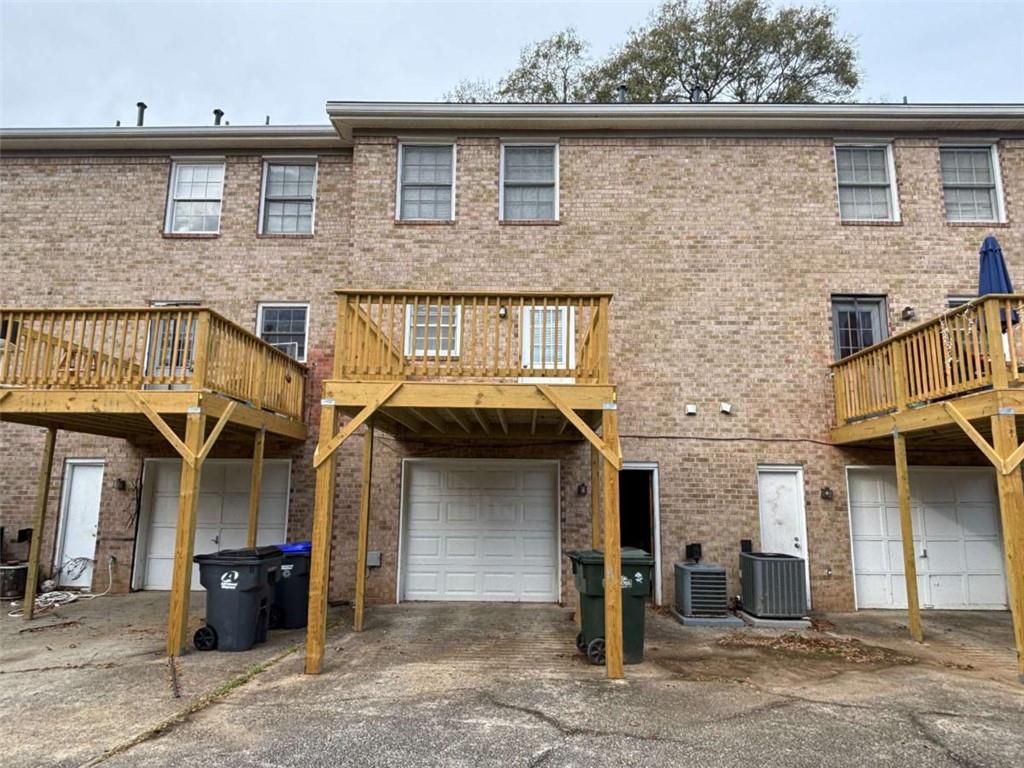 5296 Weyden Trail, Unit B Norcross, GA 30071 - Photo 22 of 22 a front view of a house with parking