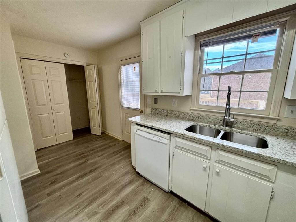5296 Weyden Trail, Unit B Norcross, GA 30071 - Photo 10 of 22 a kitchen with a sink and cabinets