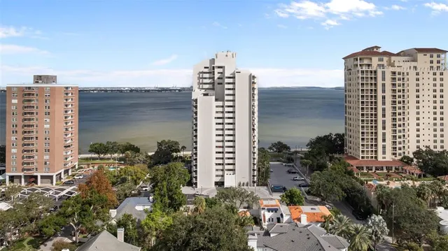 a view of a city with tall buildings