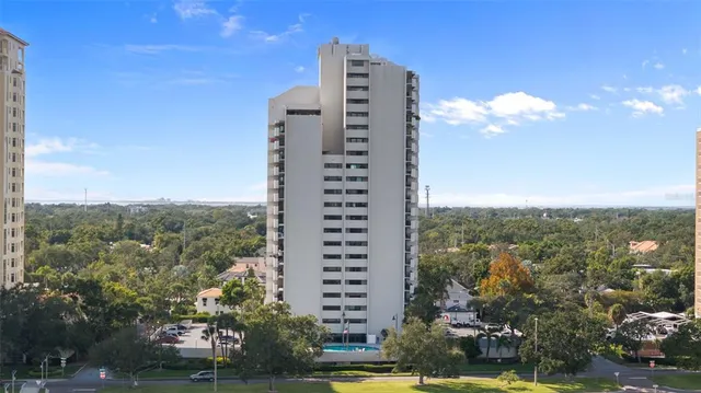 a view of a city with tall buildings