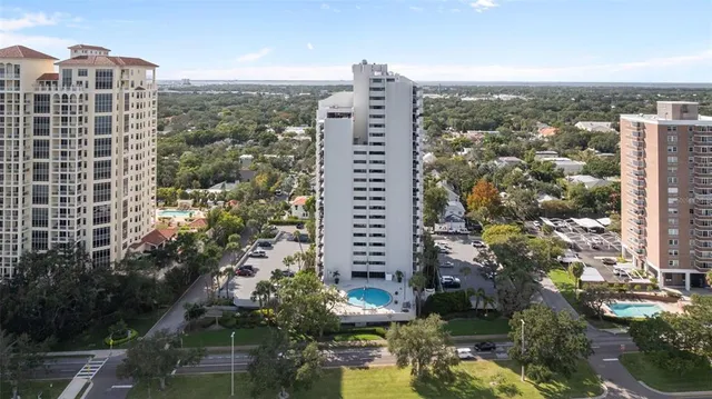 a view of a city with tall buildings