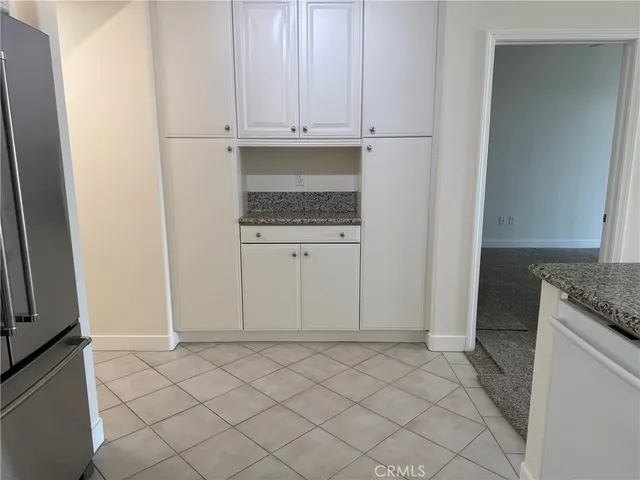 a view of cabinets and utility room