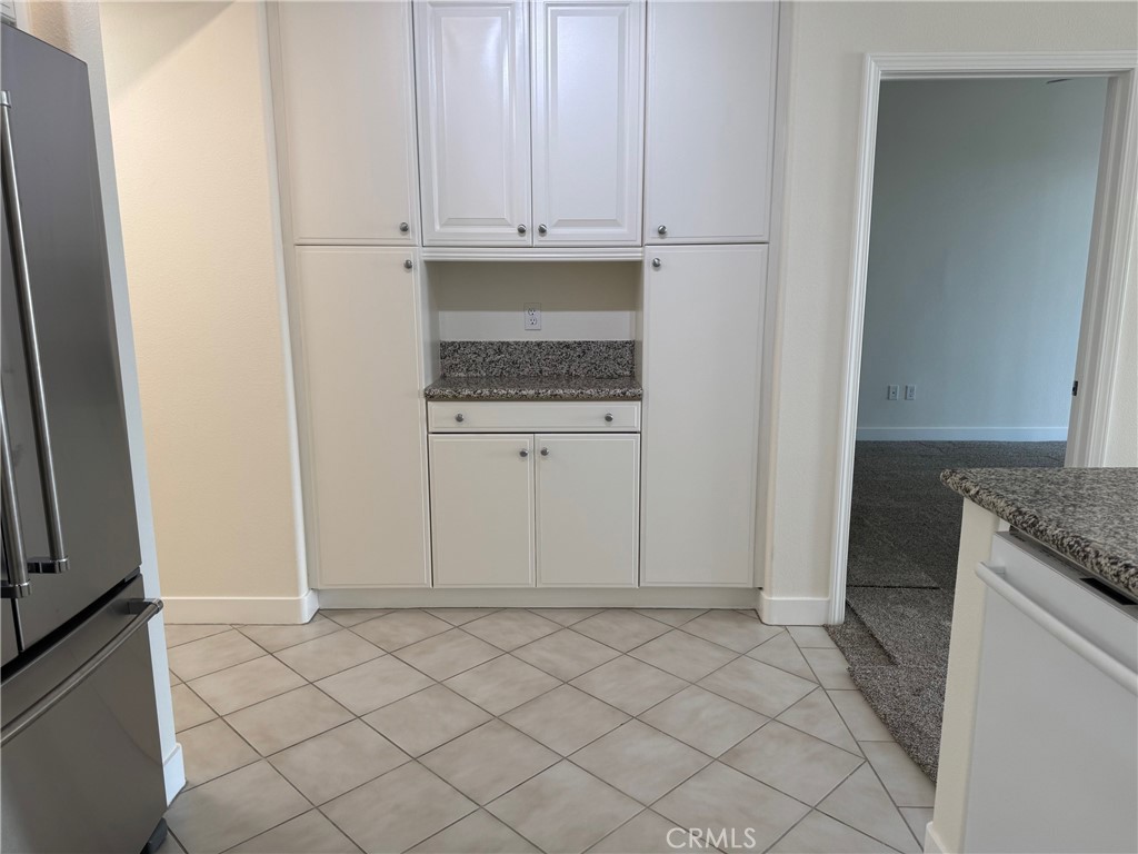 1400 East Ocean Boulevard, Unit 1203 Long Beach, CA 90802 - Photo 11 of 34 a view of cabinets and utility room