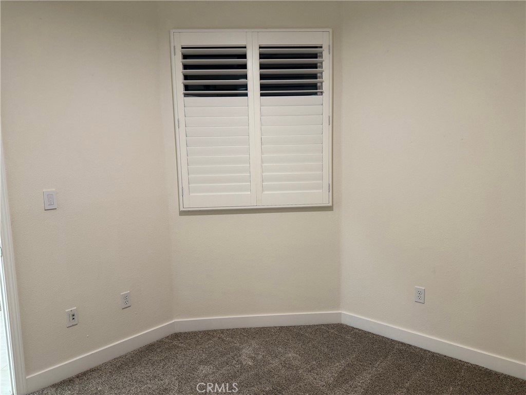 1400 East Ocean Boulevard, Unit 1203 Long Beach, CA 90802 - Photo 23 of 34 an empty room with a empty space and a window