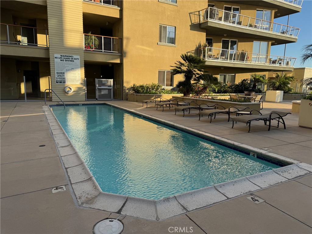 1400 East Ocean Boulevard, Unit 1203 Long Beach, CA 90802 - Photo 28 of 34 a view of a swimming pool with outdoor seating