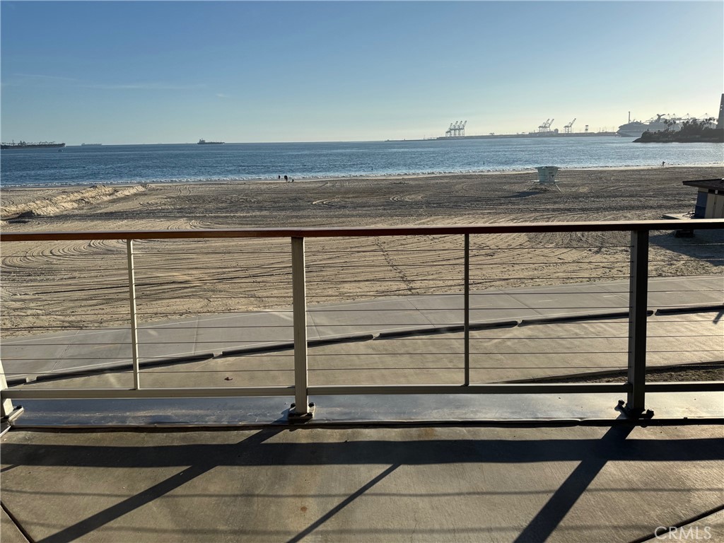 1400 East Ocean Boulevard, Unit 1203 Long Beach, CA 90802 - Photo 3 of 34 a view of a floor to ceiling window and wooden floor