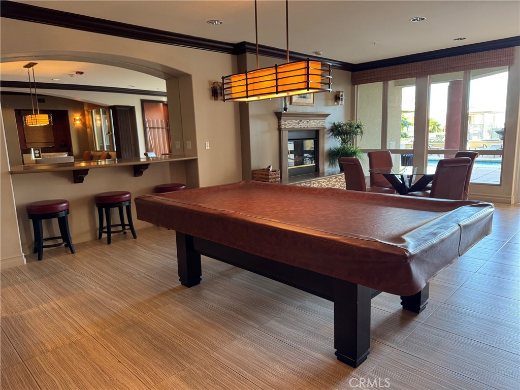 1400 East Ocean Boulevard, Unit 1203 Long Beach, CA 90802 - Photo 31 of 34 a room with wooden floor pool table and windows