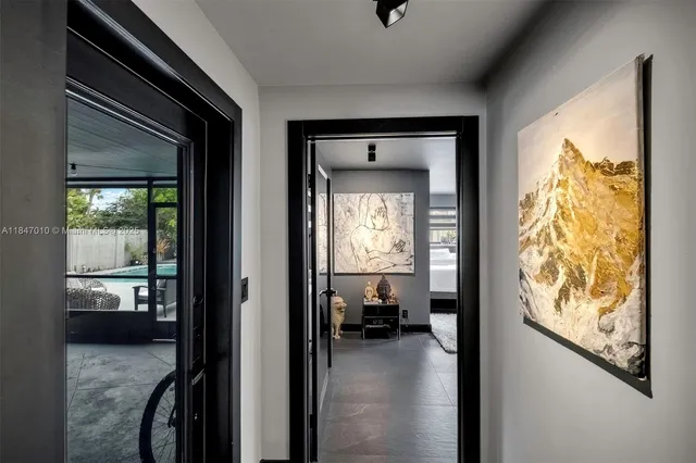 a view of a livingroom from a hallway