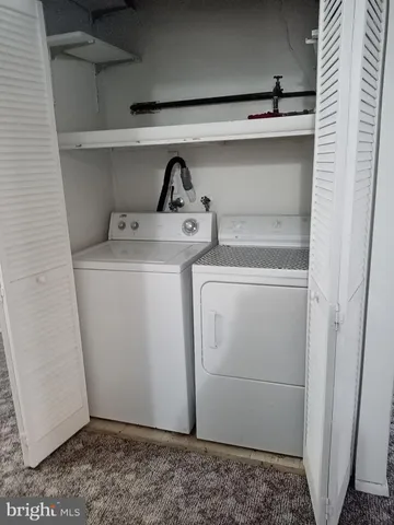 a utility room with a washer and dryer