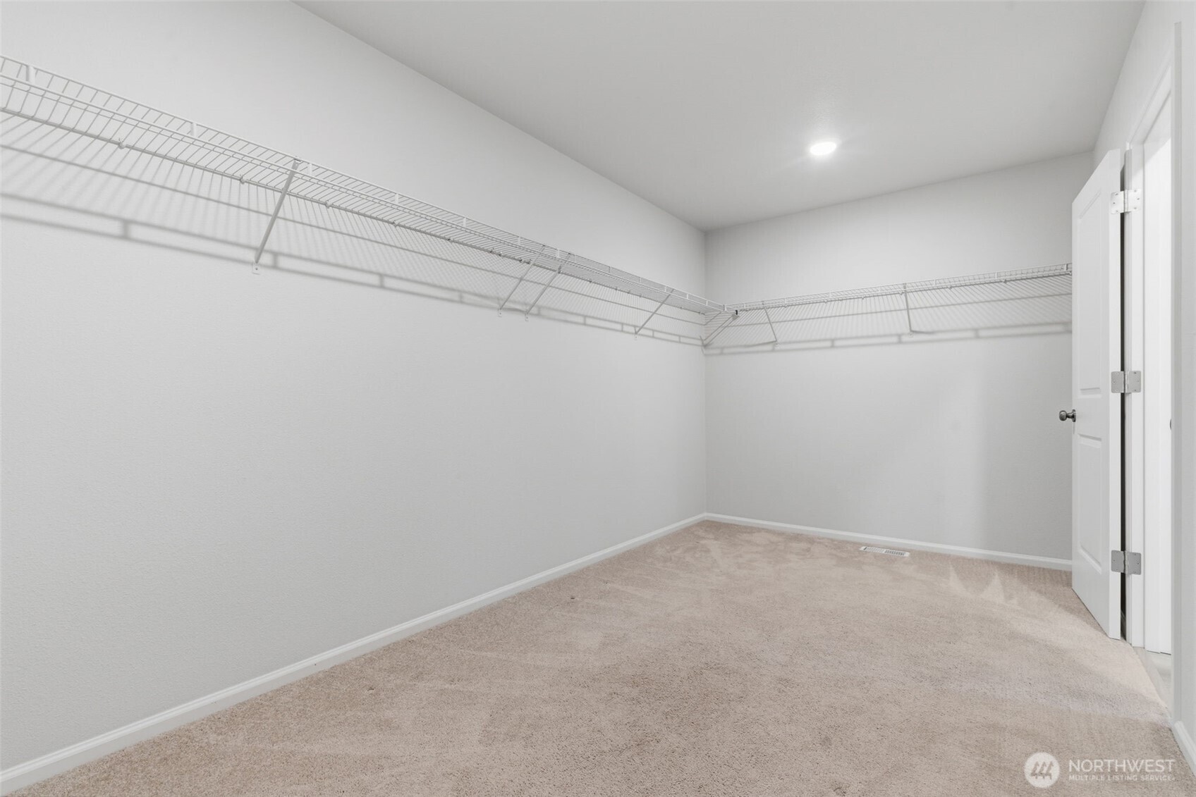 430 Northeast Ridge Point Boulevard Belfair, WA 98528 - Photo 25 of 39 a view of a room with racks on the wall