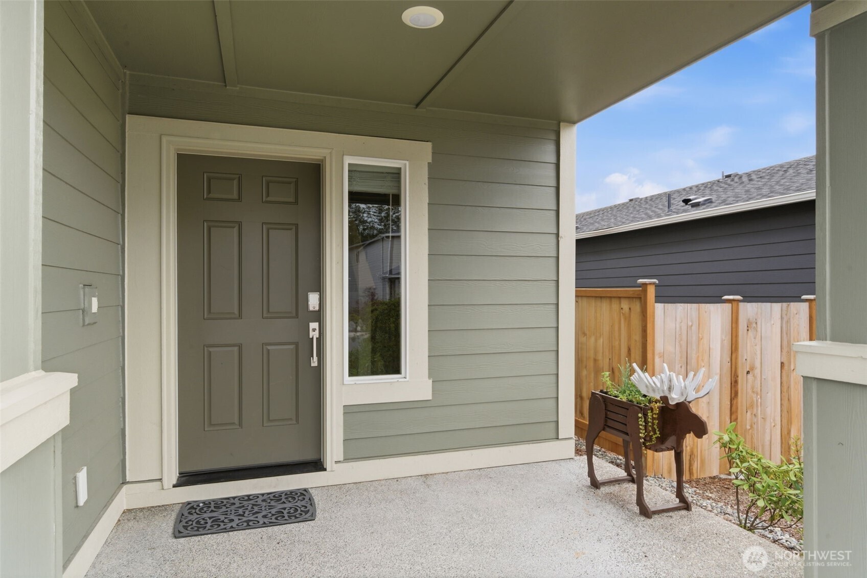 430 Northeast Ridge Point Boulevard Belfair, WA 98528 - Photo 3 of 39 a view of an entrance to house