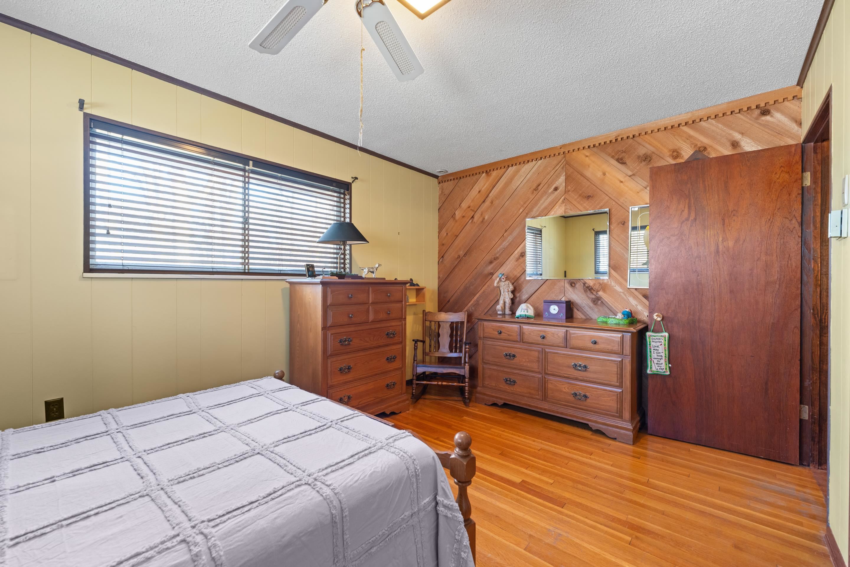 2989 Little John Road Millington, TN 38053 - Photo 18 of 34 a bedroom with a bed and a dresser