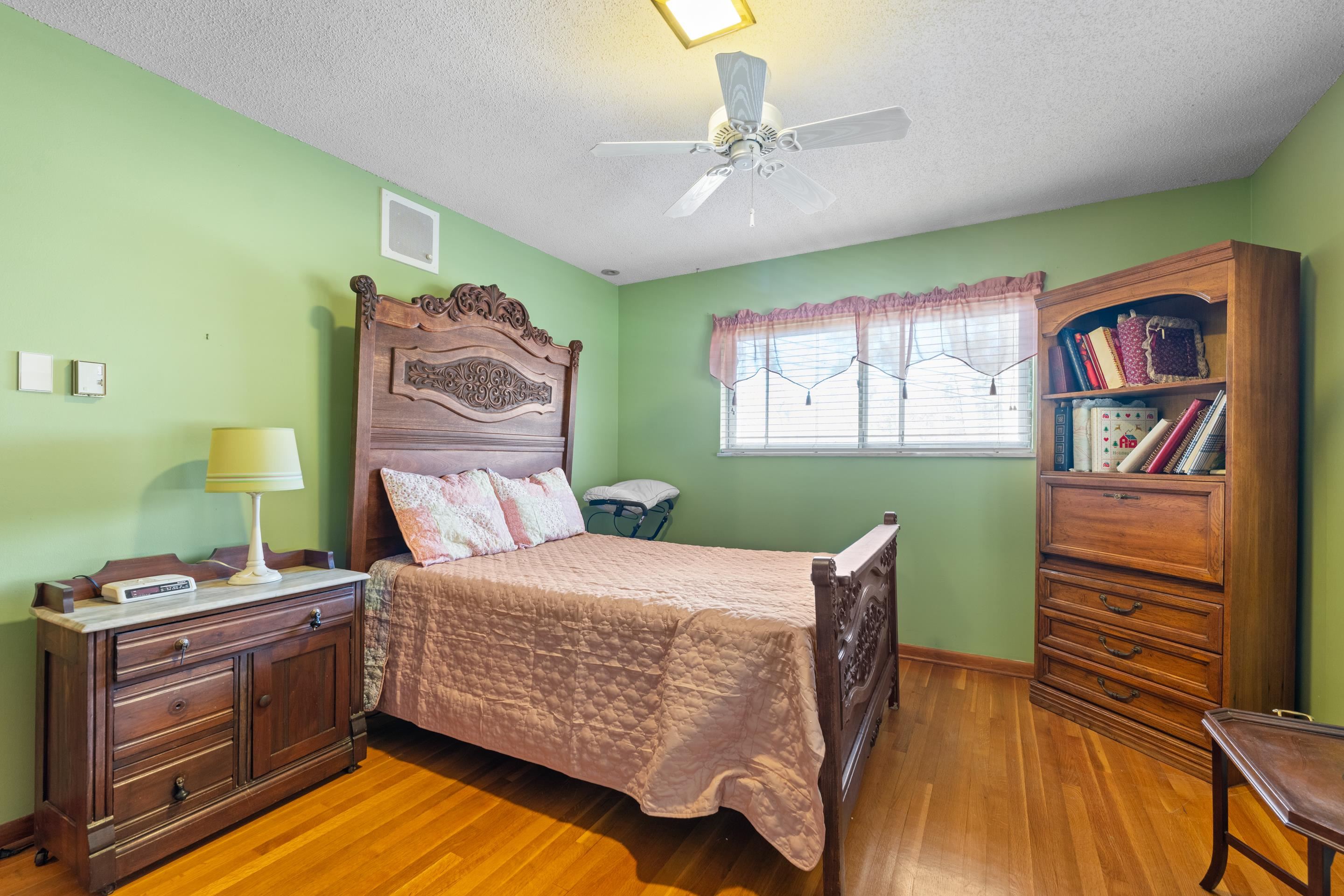 2989 Little John Road Millington, TN 38053 - Photo 20 of 34 a bedroom with a bed and a dresser in it