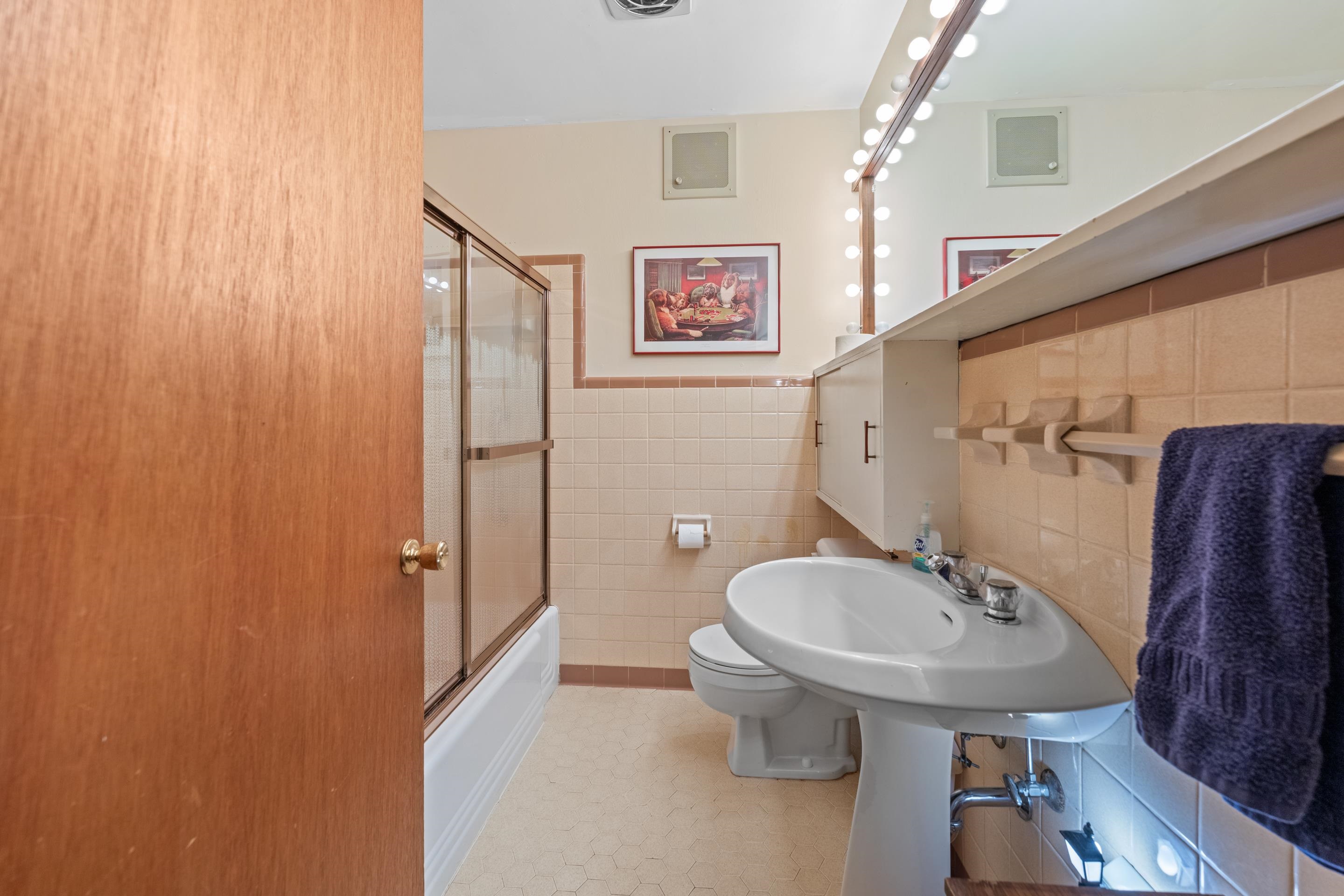 2989 Little John Road Millington, TN 38053 - Photo 22 of 34 a bathroom with a sink a toilet and shower