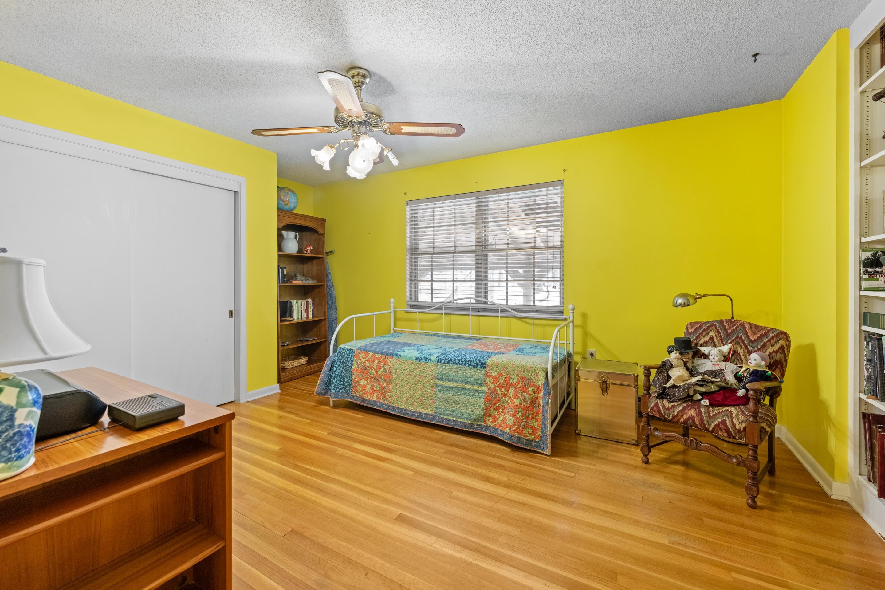 2989 Little John Road Millington, TN 38053 - Photo 24 of 34 a bedroom with a bed and wooden floor