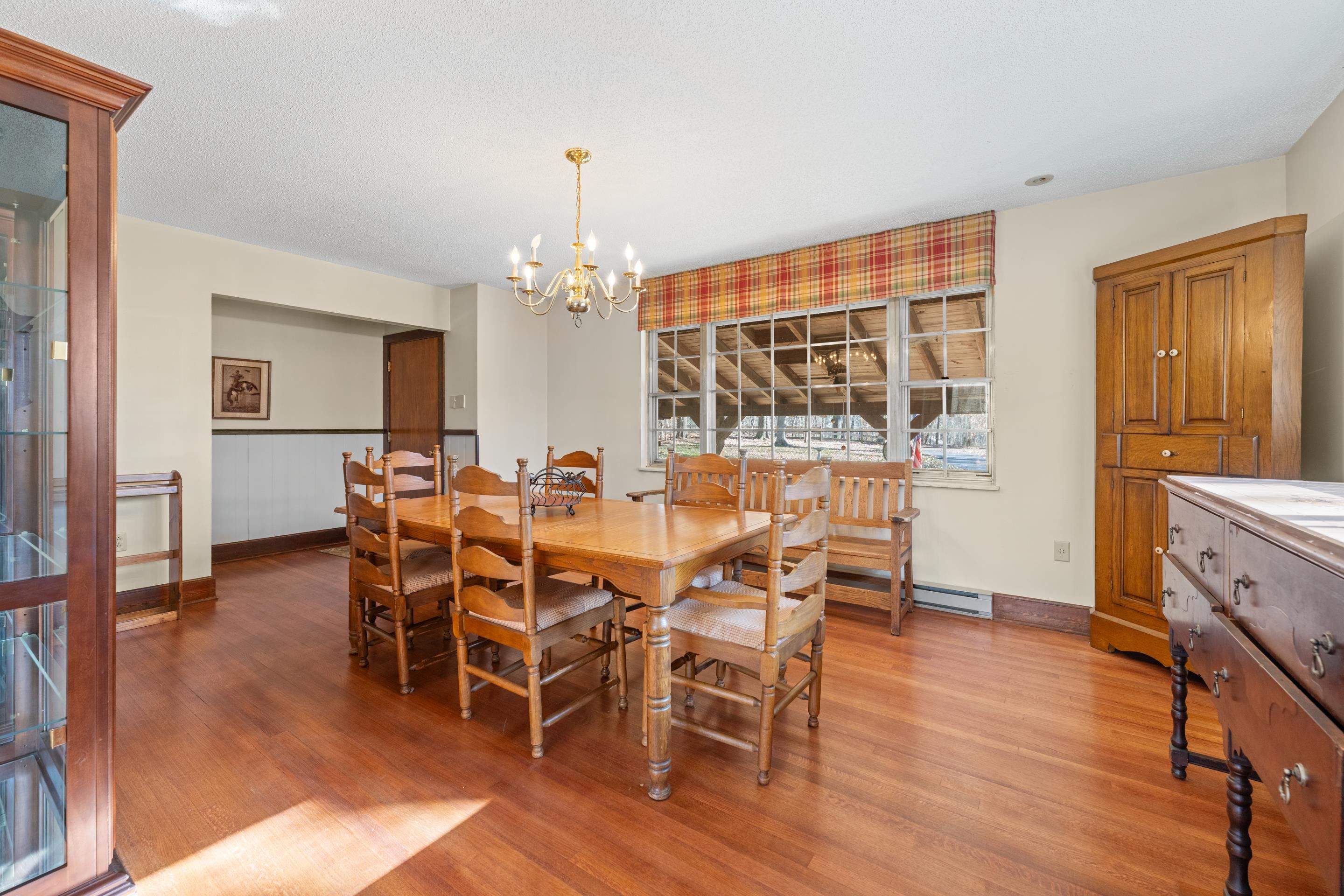 2989 Little John Road Millington, TN 38053 - Photo 9 of 34 a view of a dining room with furniture window and wooden floor
