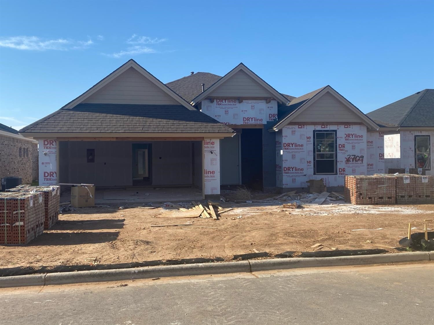 2709 138th Street Lubbock, TX 79423 - Photo 1 of 10 front view of a house with a yard
